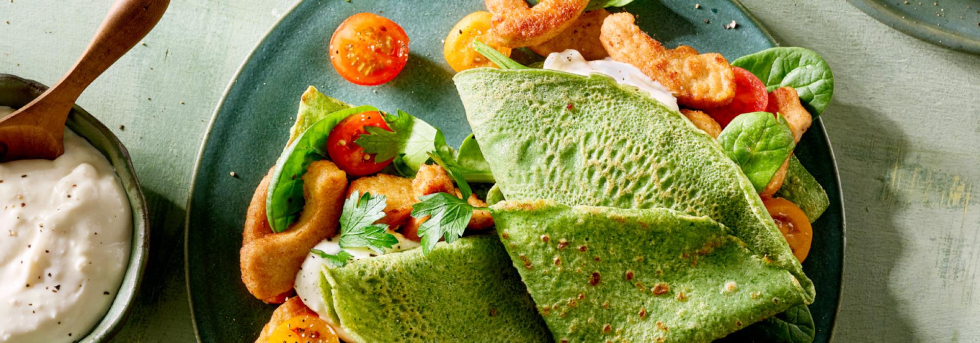 Stuffed spinach crêpes with lightly roasted pieces